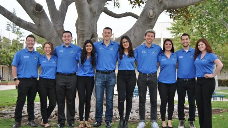 ASMC Board poses in front of a tree on the Moorpark College campus.